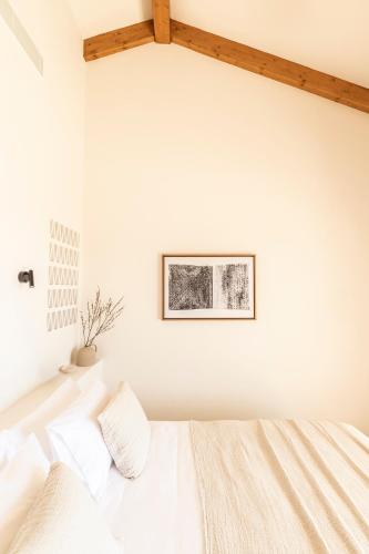 Postel nebo postele na pokoji v ubytování AVERTOSIA Luxury Villas