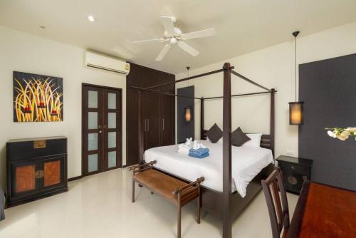 Postel nebo postele na pokoji v ubytování Villa Flores by Tropiclook
