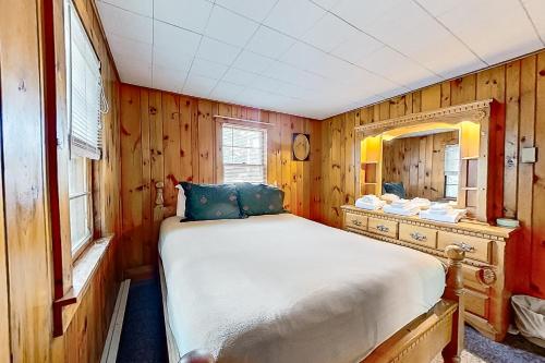 Säng eller sängar i ett rum på Balmoral Getaway