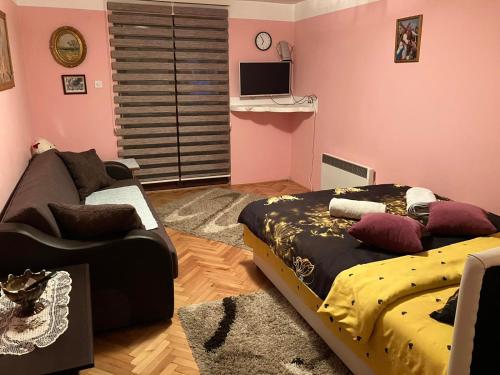 Krevet ili kreveti u jedinici u okviru objekta Apartmani Rada