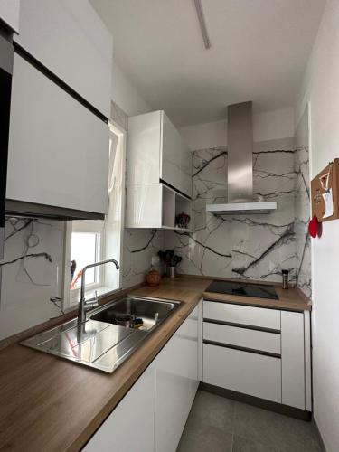 Kuchyň nebo kuchyňský kout v ubytování Piccola Oasi