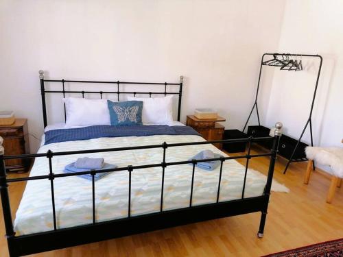 Un ou plusieurs lits dans un hébergement de l'établissement Apartman Nostalgia u Sarajevu