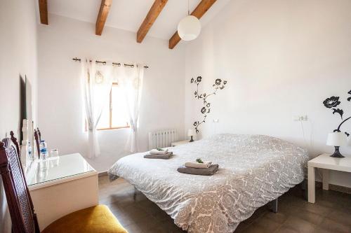 Postel nebo postele na pokoji v ubytování Villa Carmen