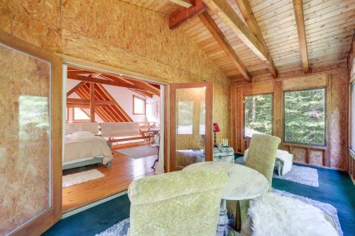 a bedroom with a bed and a table and chairs at Butler Retreat on 60 Acres Near Beech Mountain! in Beech Mountain