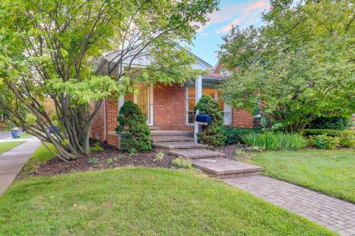 a brick house with stairs in the yard at Royal Oak Home 13 Mi to Downtown Detroit in Royal Oak