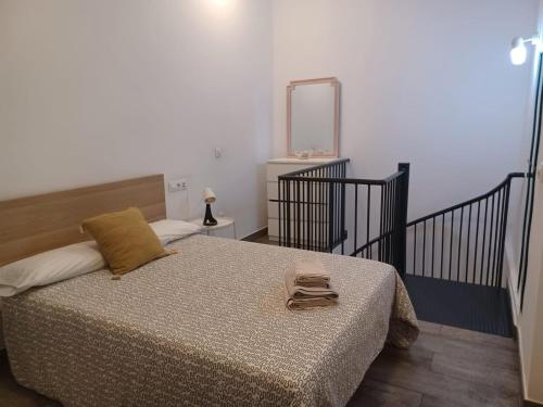 Posteľ alebo postele v izbe v ubytovaní Apartamento en el casco antiguo en plena Alameda