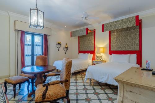 Postel nebo postele na pokoji v ubytování Hotel Casa Primavera Boutique & Spa
