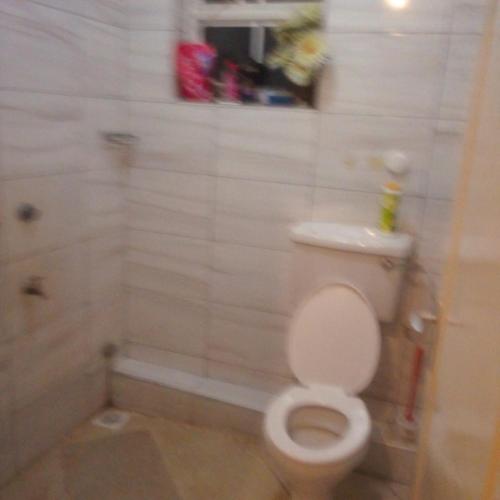 Ванная комната в Nyashville Homes