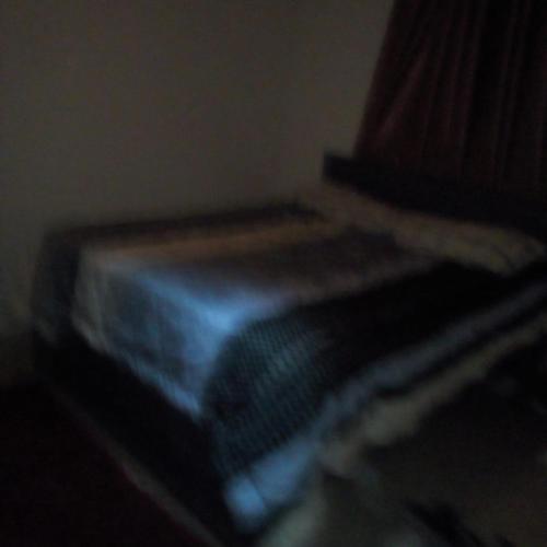 Кровать или кровати в номере Nyashville Homes