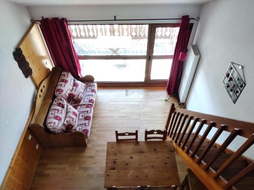 an overhead view of a living room with a couch at Appartement 2/4 personnes in Bolquere Pyrenees 2000