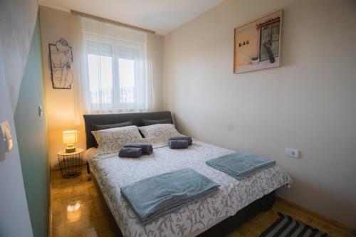 Krevet ili kreveti u jedinici u okviru objekta Apartman Iris