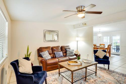 a living room with a couch and a table at Pet-Friendly Lakeland Escape with Private Pool! in Lakeland