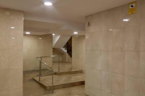 a staircase in a building with a stair case at Glorias:Sagrada Familia 15 minutos - Playa 20 minutos in Barcelona