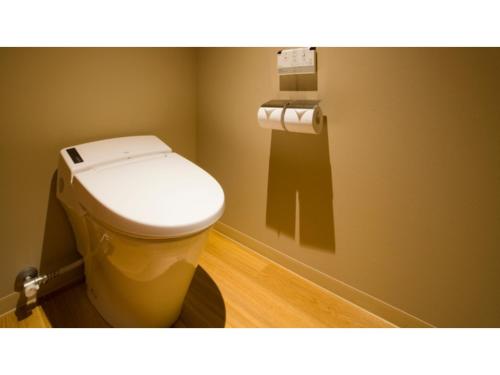 a bathroom with a toilet in a room at GRIDS Premium Hotel Otaru - Vacation STAY 68533v in Otaru