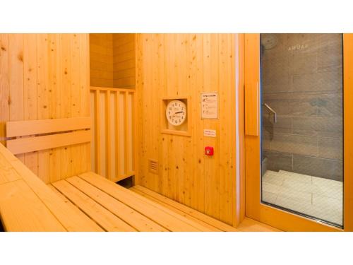 a cabin with a sauna with a sign on it at GRIDS Premium Hotel Otaru - Vacation STAY 68545v in Otaru