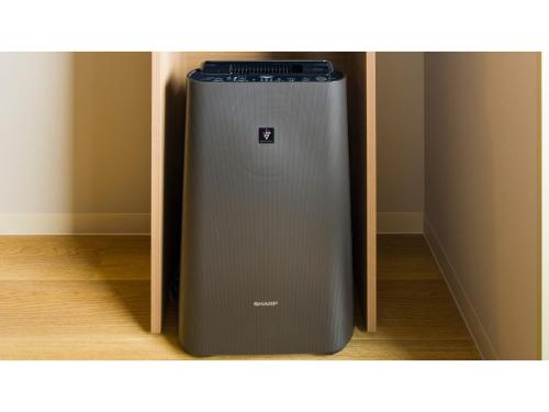 a grey refrigerator in a corner of a room at GRIDS Premium Hotel Otaru - Vacation STAY 68545v in Otaru