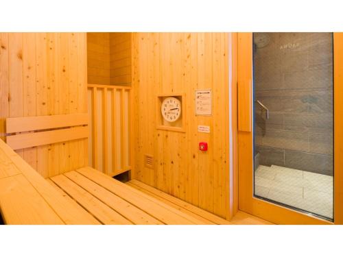 a cabin with a sauna with a sign on it at GRIDS Premium Hotel Otaru - Vacation STAY 68537v in Otaru