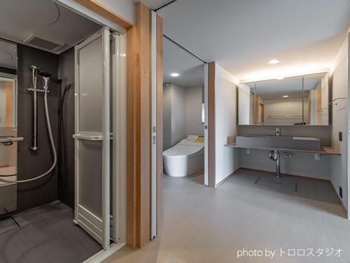 a bathroom with a shower and a sink and a toilet at Muginowa - Vacation STAY 38280v in Kuwana