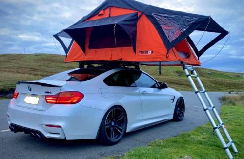a car with a tent on top of it at Tentbox Lite 2.0 in Thorpe le Soken