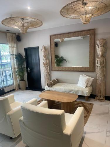 Posezení v ubytování Moet Medellin Hotel
