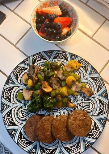 a blue and white plate of food on a counter at 1001 Nights Historic Bed and Breakfast Adults Only in Saint Augustine