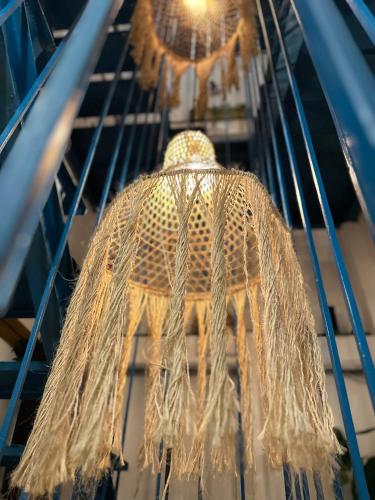 a dream catcher is hanging from a ceiling at Hotel Casa Lucca in Medellín