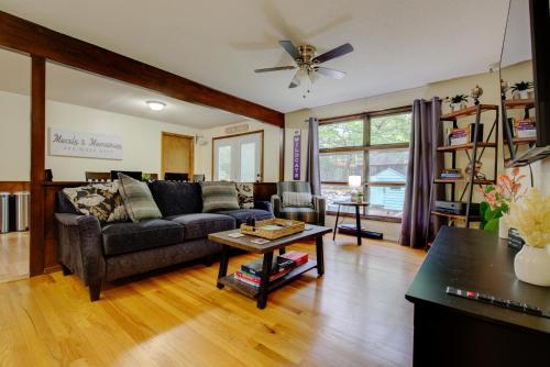a living room with a couch and a table at The Greenwood in Manhattan