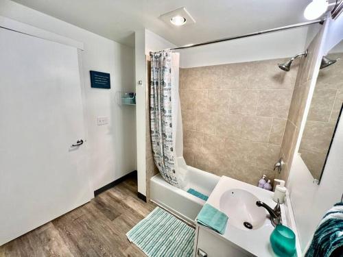 a bathroom with a sink and a shower at Apartment Studio with Shared Bathroom on the 1st Floor 10 minutes walk to University of WA in Seattle