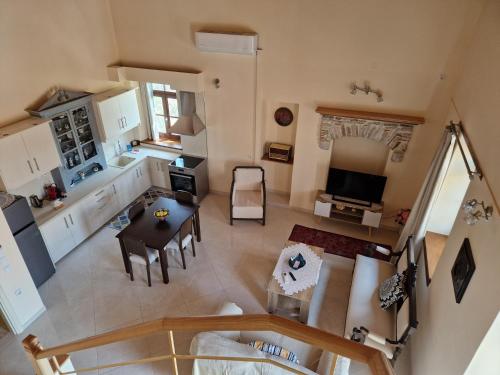 an overhead view of a kitchen and a living room at Christos Katerina House in Pythagoreio