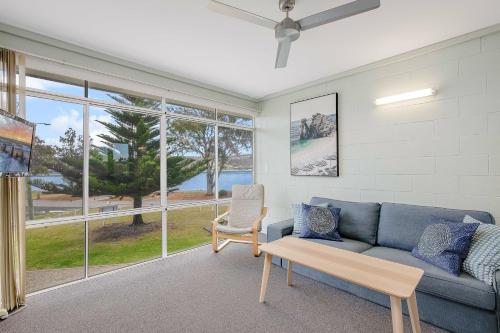 Un lugar para sentarse en Fishpen Holiday Apartments