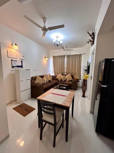 Posezení v ubytování TATA Rio De Goa ,Good Stay 1 BHK Apartment,10 min from Airport, 604