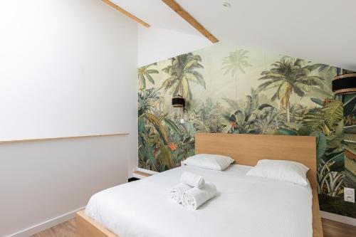 En eller flere senge i et værelse på Dify Terracotta - Villeurbanne