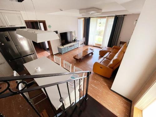 an aerial view of a kitchen and living room at Jeju TheRiche Pension in Jeju