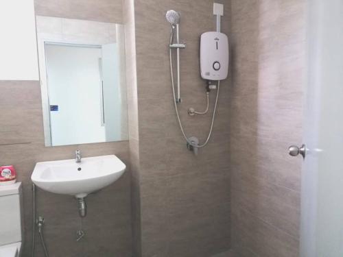 a bathroom with a shower and a sink at TR Residence MRT/Monorail/LRT/KLCC in Kuala Lumpur