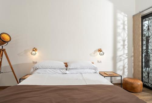 Кровать или кровати в номере alle Stelle b&b