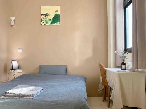 Postel nebo postele na pokoji v ubytování White Cat B&B