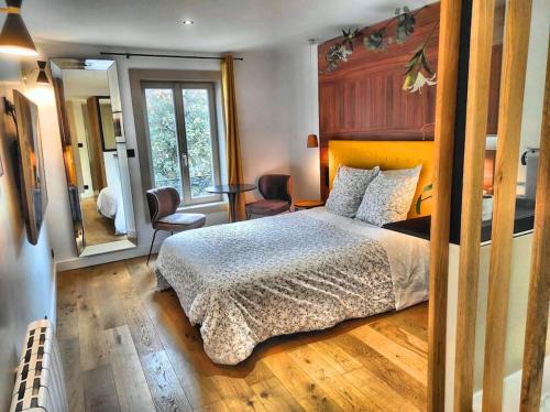 Ένα ή περισσότερα κρεβάτια σε δωμάτιο στο Suite st lô 1 Rouen (centre historique)