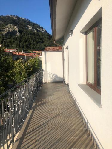 a balcony with a view of a mountain at Risto Bar Rosandra in San Dorligo della Valle