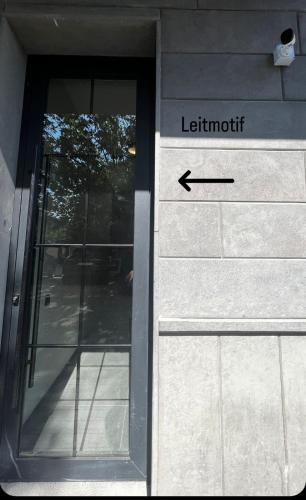 an external door of a building with a sign that says leventvent at Apart leitmotif in Tbilisi City