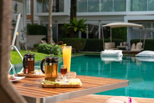 Bazén v ubytování Chi Samui Resort nebo v jeho okolí