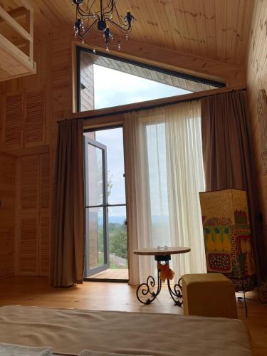 Una cama o camas en una habitación de Skijis Sakhli