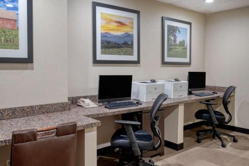 an office with a desk with a computer and a printer at Hampton Inn St. Louis/Collinsville in Collinsville