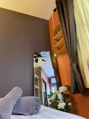 En eller flere senge i et værelse på VarietyD-DayHostel HuaHin