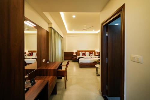 Ένα ή περισσότερα κρεβάτια σε δωμάτιο στο Zip By Spree Hotels PurpleOrchid Whitefield