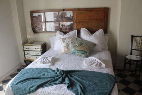 En eller flere senge i et værelse på Casa rural 3R