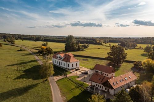 an aerial view of a large house in a field at Zámeček - Chateau Lány in Břeclav