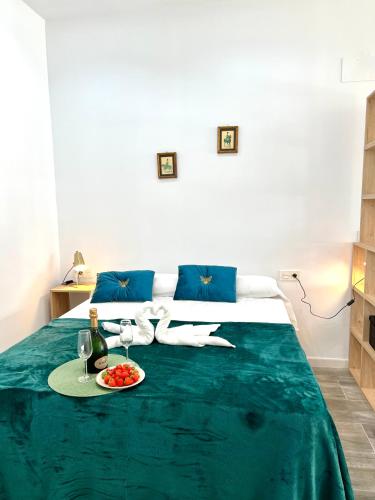 Ένα ή περισσότερα κρεβάτια σε δωμάτιο στο Estudio Jacaranda Marina