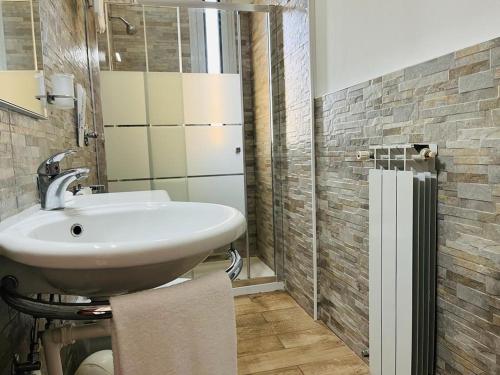 Koupelna v ubytování Hotel Malpensafiera