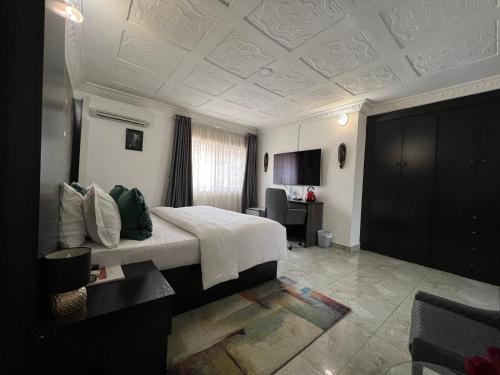 Una cama o camas en una habitación de UrbaN RootZ