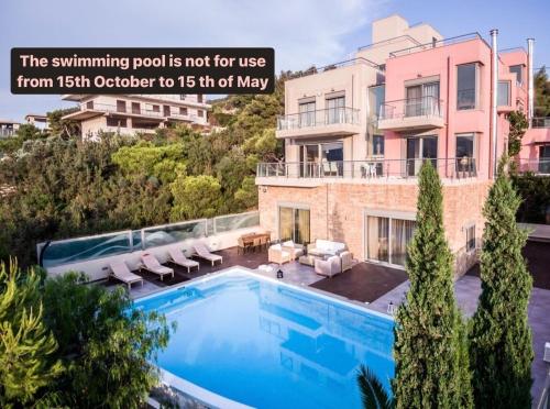 Φωτογραφία από το άλμπουμ του Deluxe Maisonette With Shared Pool 1# στην Ανάβυσσο